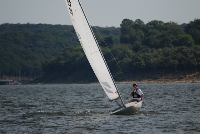 MC Scow sailing close to shore